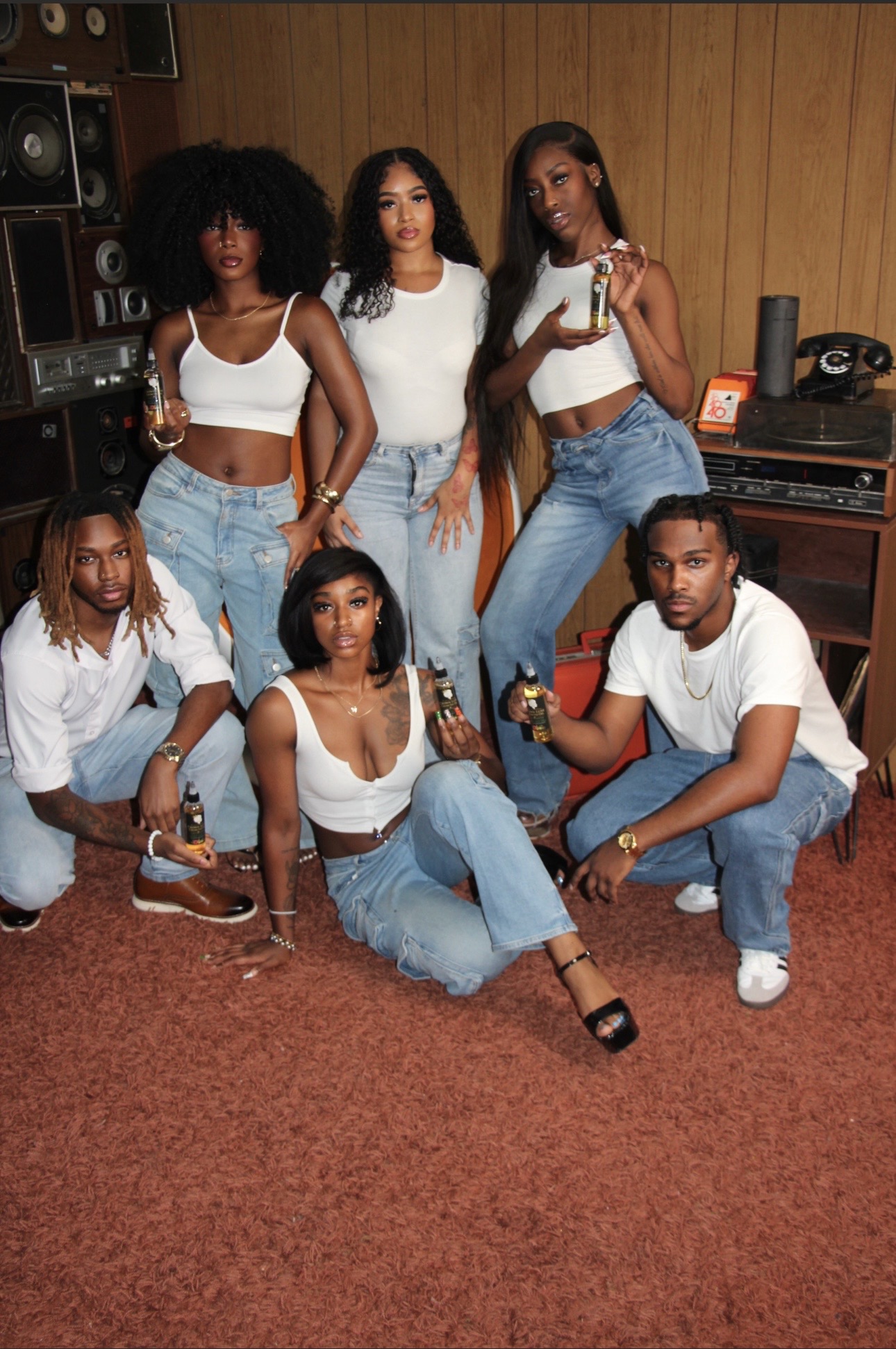 Beauty in the Making campaign group wearing white tops and denim