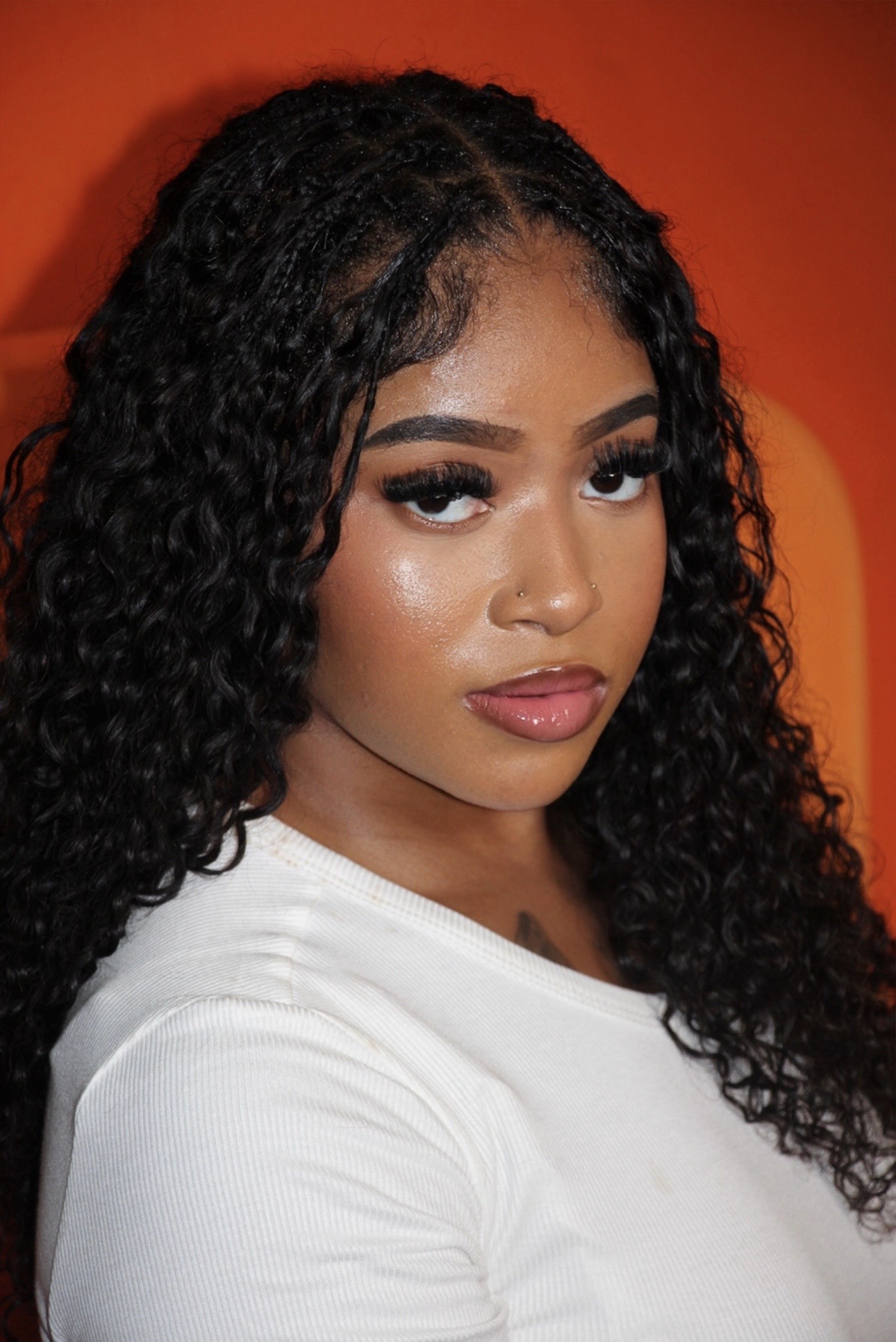 Campaign close-up showing long, textured curls